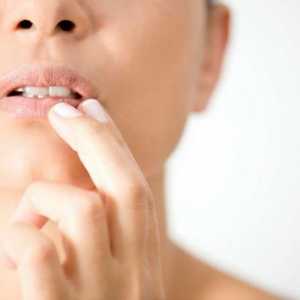 Точка по устните червени: причини и лечение